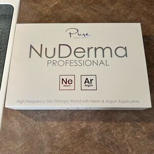 NuDerma skin therapy wands new in box